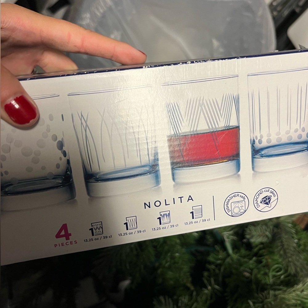 Brand new set of 4 glasses